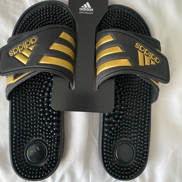 adidas black and gold slides